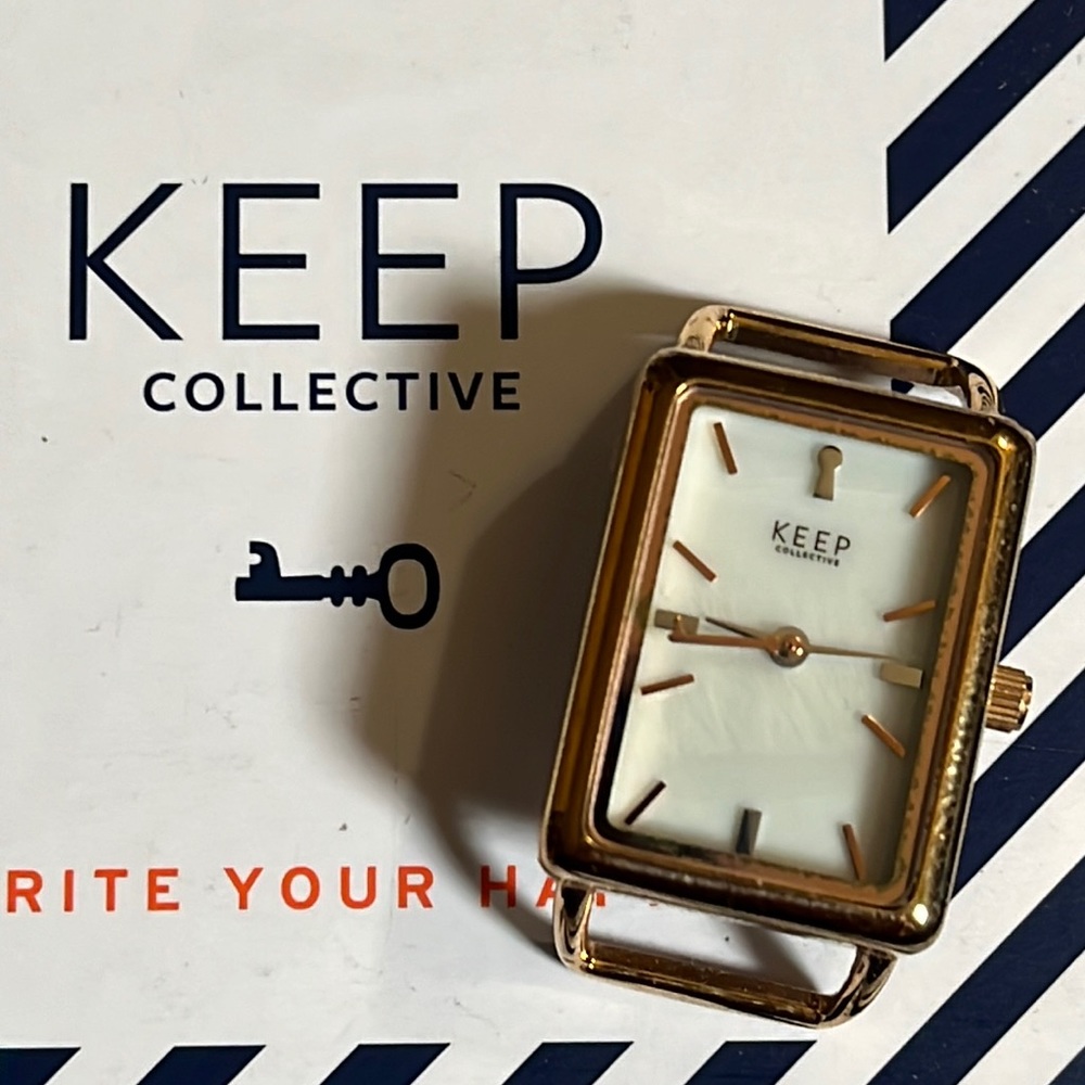 Excellent condition keep collective rose gold tank watch face.  Needs battery.
